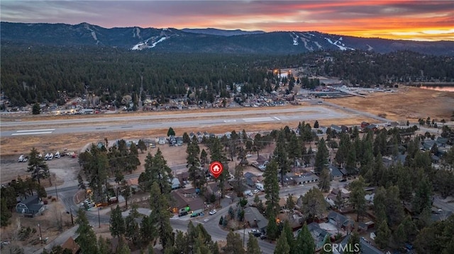 aerial view at dusk with a mountain view