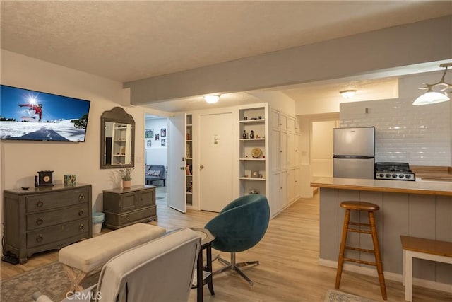 living room with light wood-type flooring