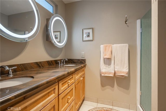 bathroom with vanity and tile patterned flooring