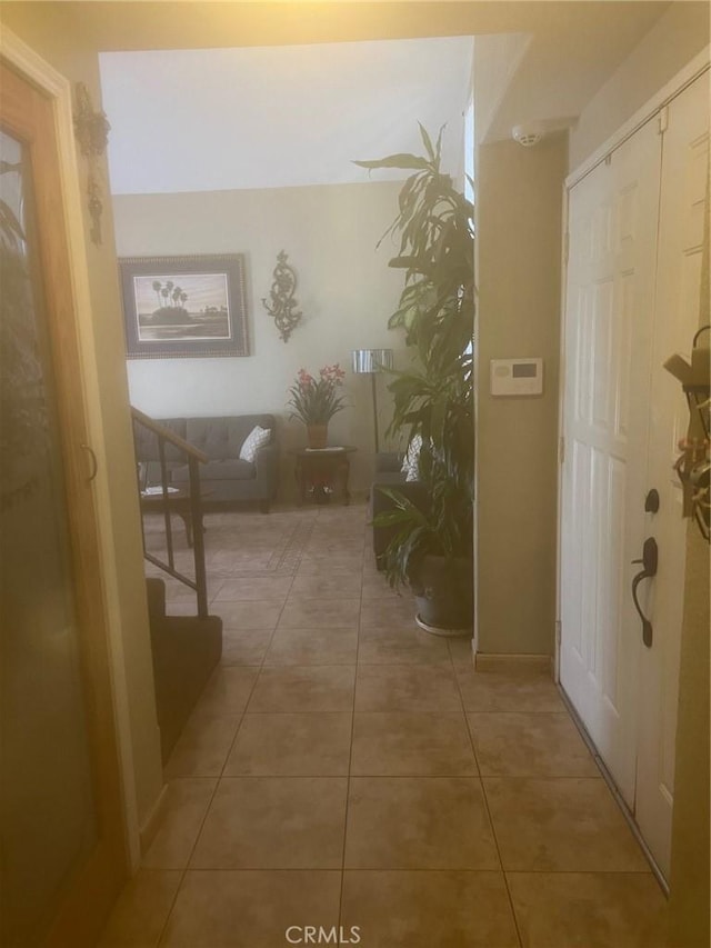 hall featuring tile patterned floors