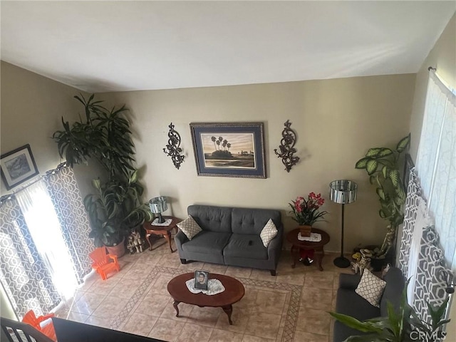 living room with light tile patterned floors