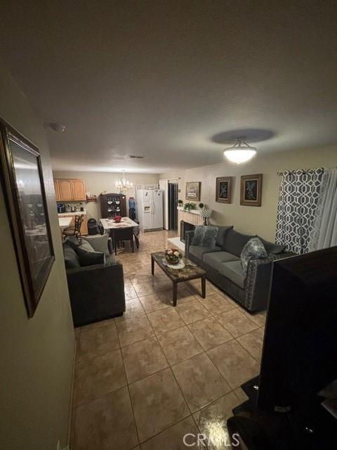 living room featuring light tile patterned floors