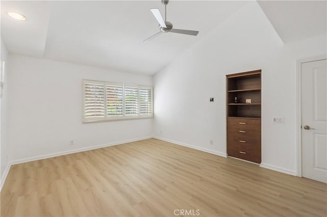 unfurnished bedroom featuring ceiling fan, light hardwood / wood-style flooring, and high vaulted ceiling