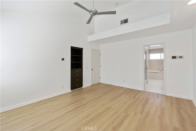 unfurnished room featuring ceiling fan and light hardwood / wood-style flooring