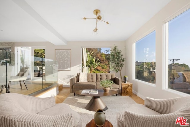 sunroom with beamed ceiling