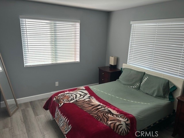 bedroom featuring hardwood / wood-style floors