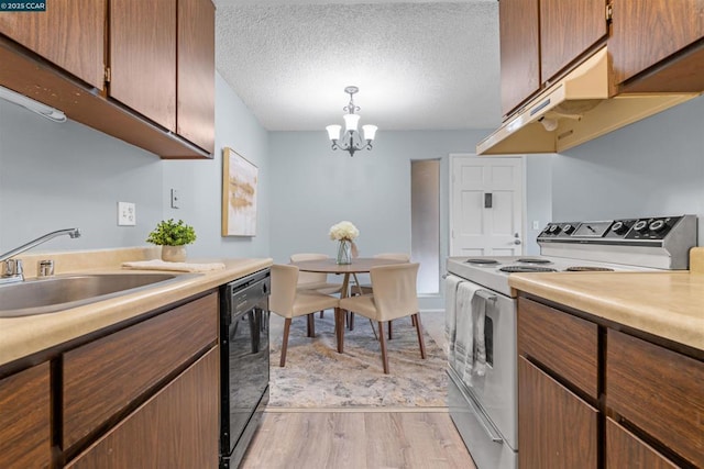 kitchen featuring dishwasher, an inviting chandelier, white range with electric stovetop, a textured ceiling, and decorative light fixtures