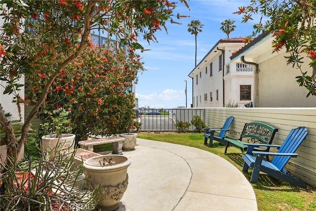 view of patio featuring fence