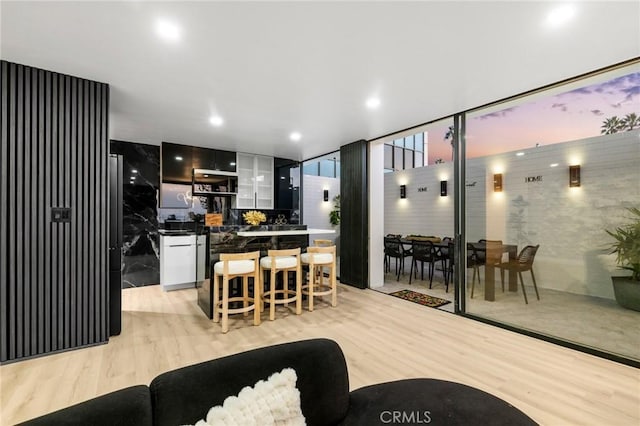 living area with light wood-style floors