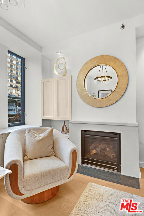 sitting room with light wood-type flooring