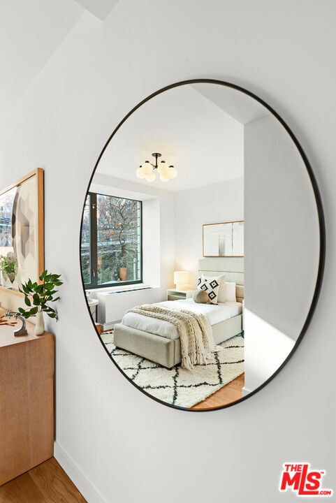 bedroom featuring hardwood / wood-style flooring