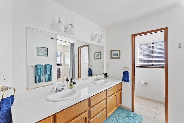 bathroom featuring tile patterned floors and vanity