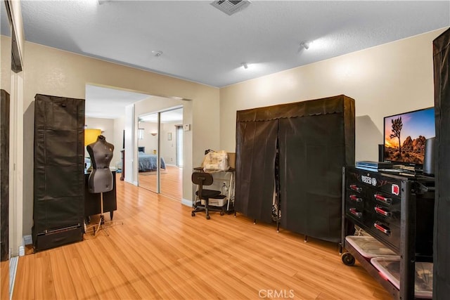 misc room with light wood-type flooring