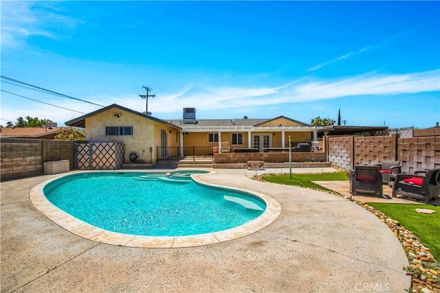 view of pool featuring a patio area