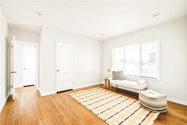 unfurnished room featuring light hardwood / wood-style flooring