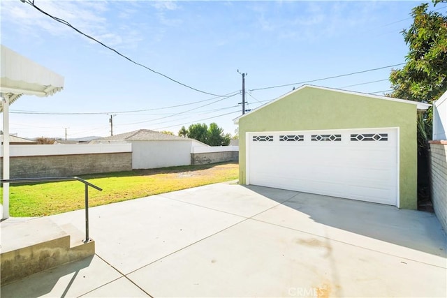 garage with a yard