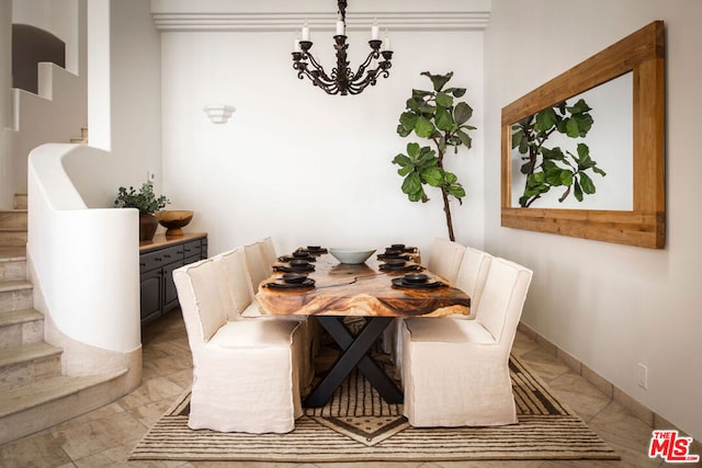 dining room featuring a notable chandelier