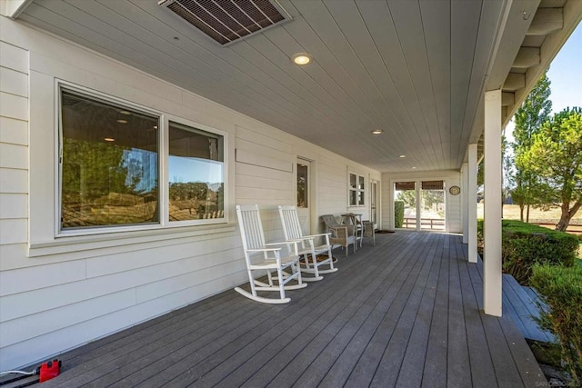 wooden deck featuring a porch