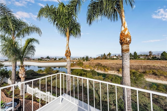 balcony featuring a water view