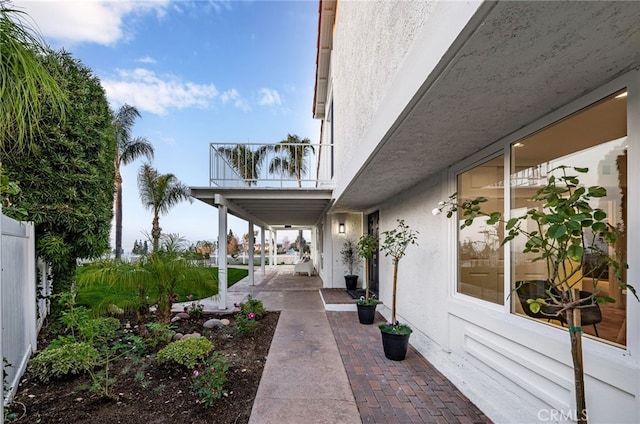 view of patio with a balcony