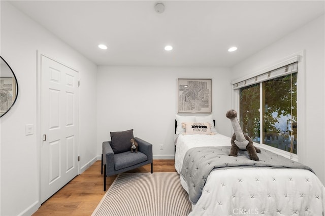 bedroom featuring hardwood / wood-style flooring