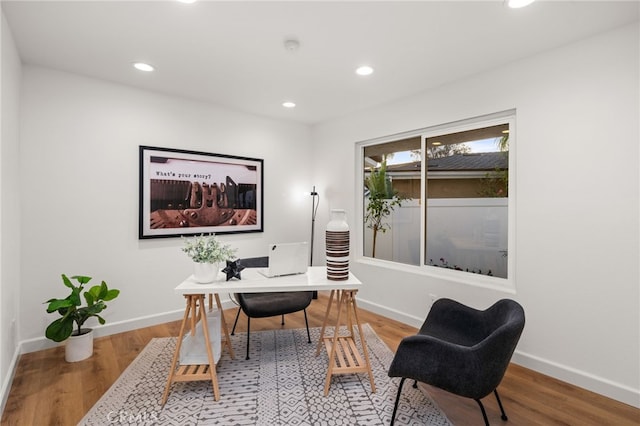 home office featuring hardwood / wood-style floors