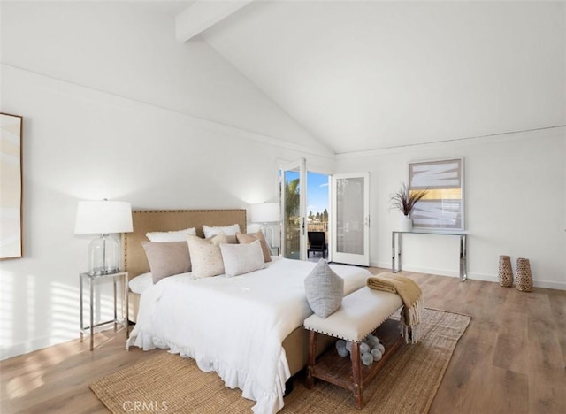 bedroom with beam ceiling, hardwood / wood-style flooring, access to outside, and high vaulted ceiling