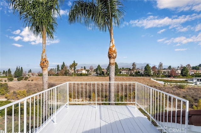 wooden deck featuring a mountain view