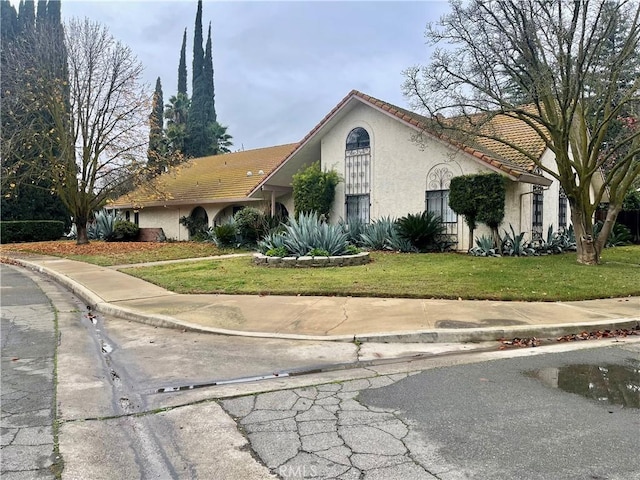 view of front of house with a front yard