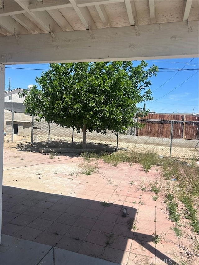 view of patio / terrace with fence