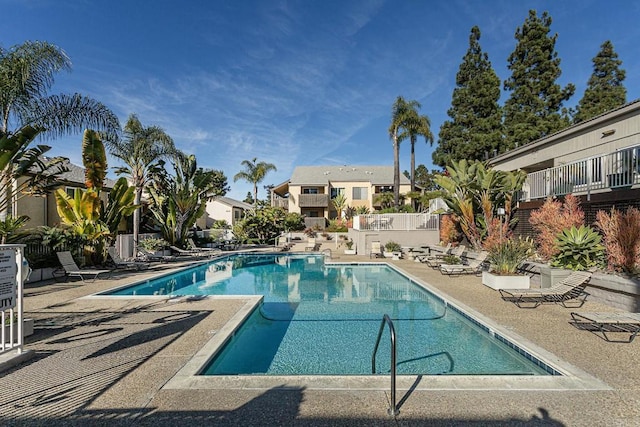 view of swimming pool featuring a patio area