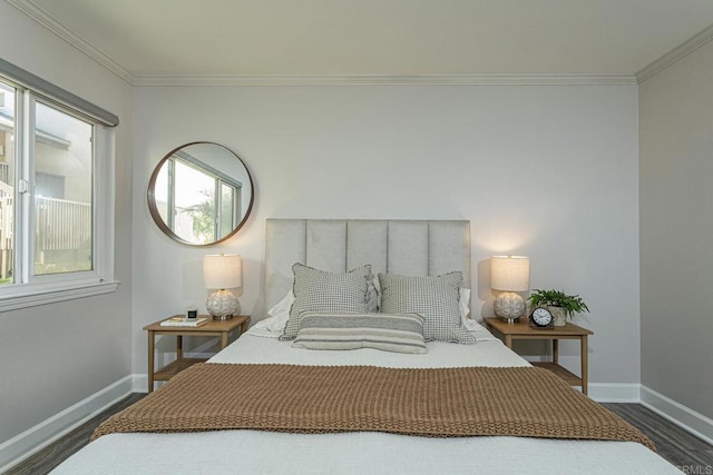 bedroom with crown molding and dark wood-type flooring