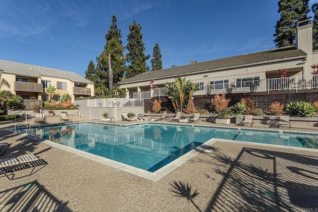 view of swimming pool featuring a patio