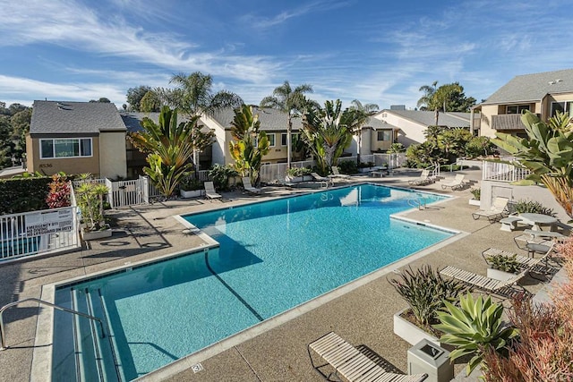 view of swimming pool featuring a patio