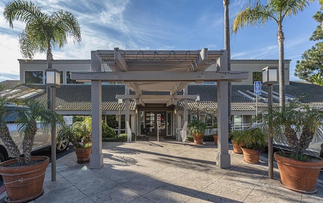 view of patio / terrace with a pergola and french doors