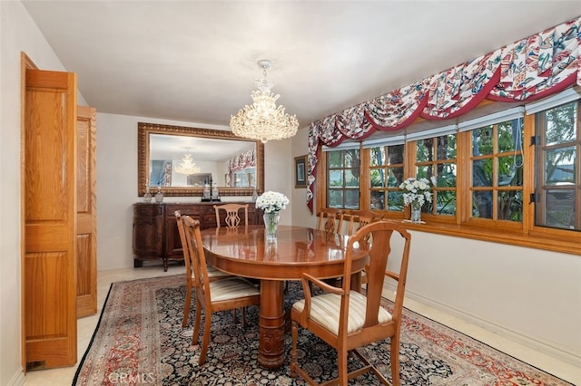 dining room featuring a notable chandelier