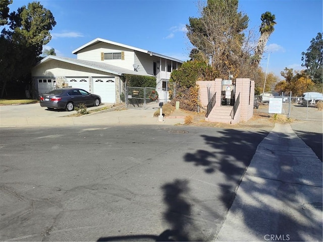 view of front of property featuring a garage