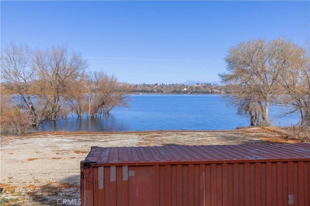 view of yard with a water view