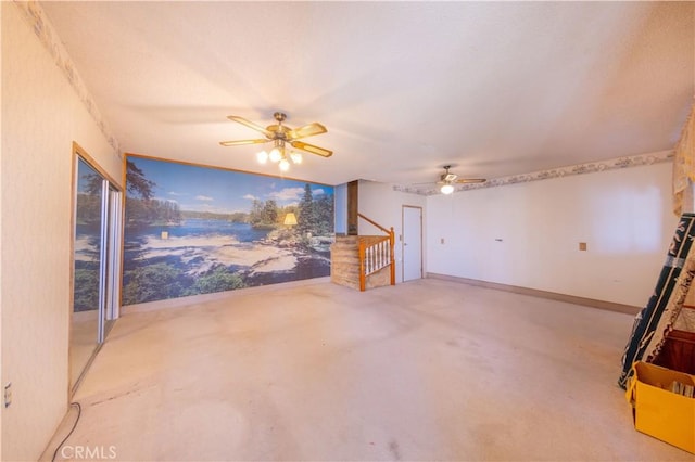 unfurnished living room featuring ceiling fan