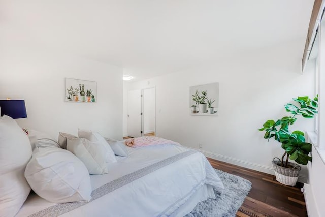 bedroom featuring dark hardwood / wood-style floors