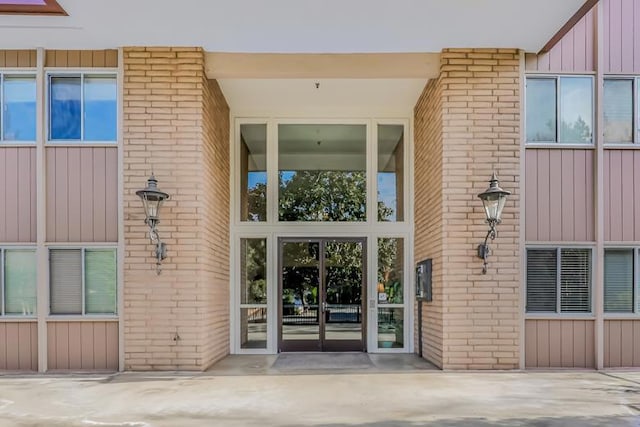 doorway to property featuring french doors