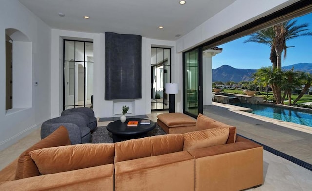 living room featuring a mountain view