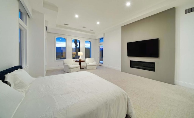 bedroom with light colored carpet