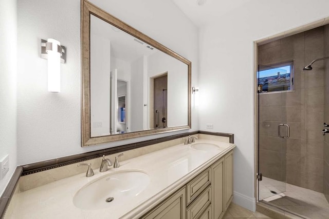 bathroom with walk in shower, vanity, tile patterned flooring, and toilet