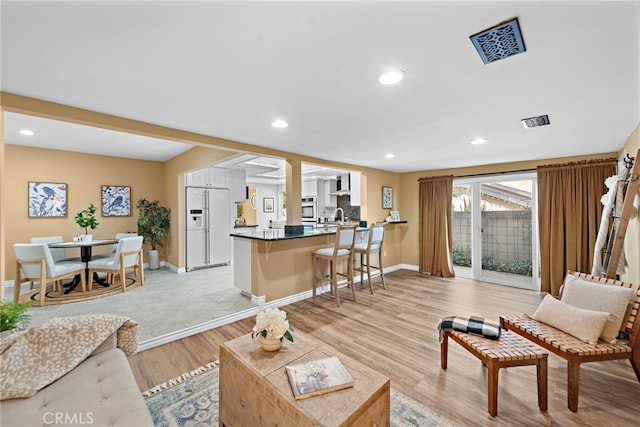 living room with light wood-type flooring