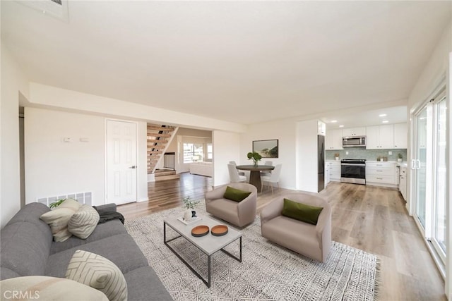 living room featuring light wood-type flooring