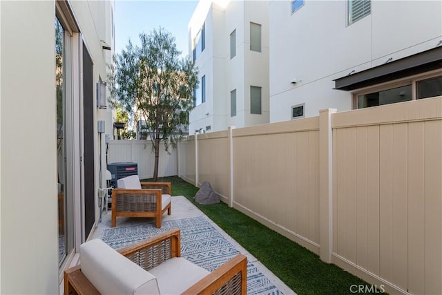 view of patio / terrace with cooling unit