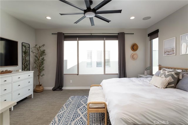 carpeted bedroom with ceiling fan