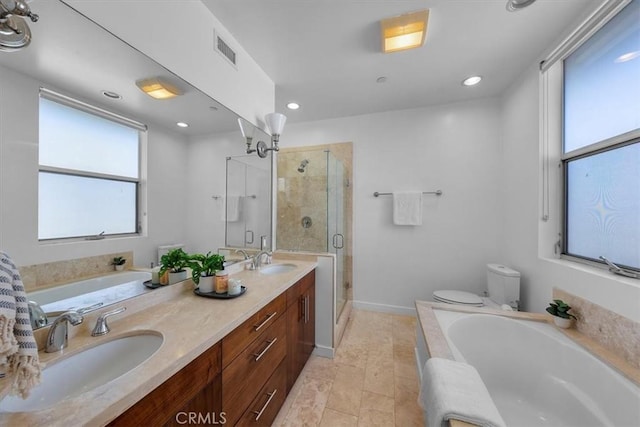 full bathroom with vanity, toilet, and shower with separate bathtub