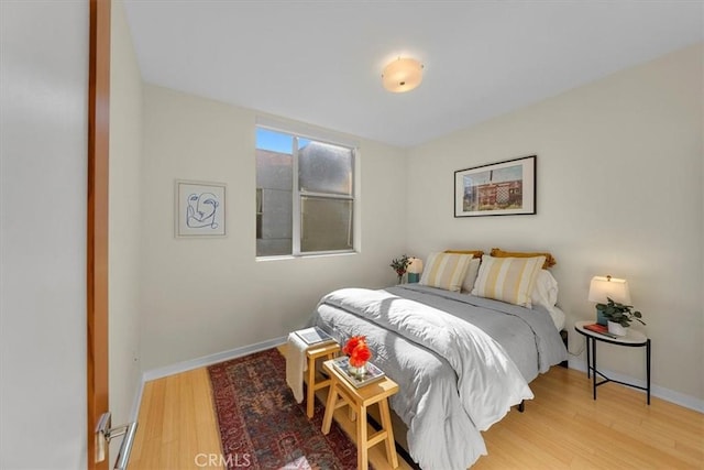 bedroom featuring hardwood / wood-style flooring